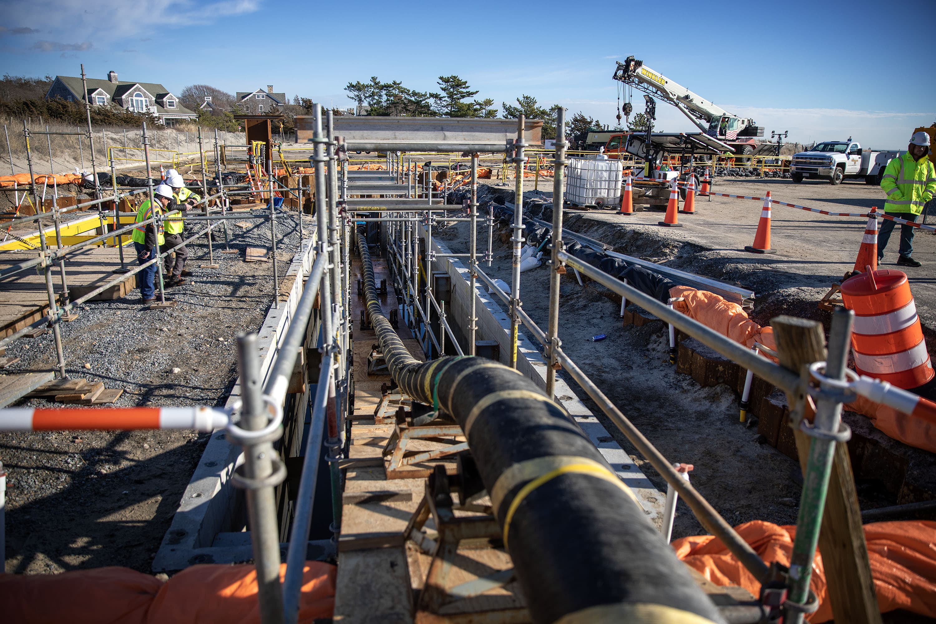 A landfall cable emerges in a transition joint bay, where it will be connected to the cables that will carry the power underground to an electrical substation further inland. (Robin Lubbock/WBUR)