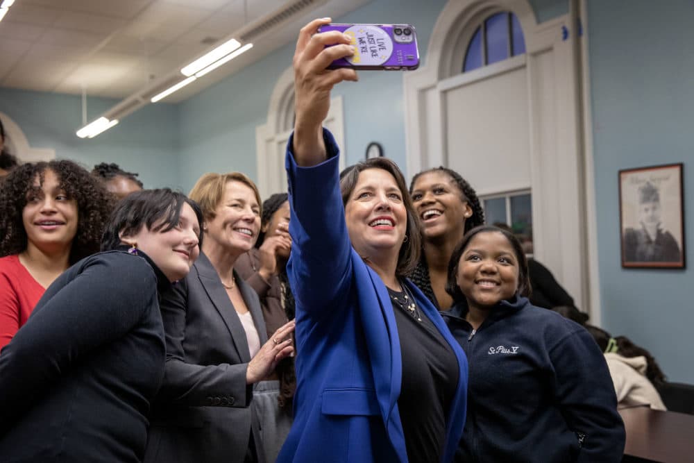 On their first day as Governor-elect and Lieutenant Governor-elect, Maura Healey and Kim Driscoll take a selfie with a group of students at Girls Inc. of Lynn. (Robin Lubbock/WBUR)