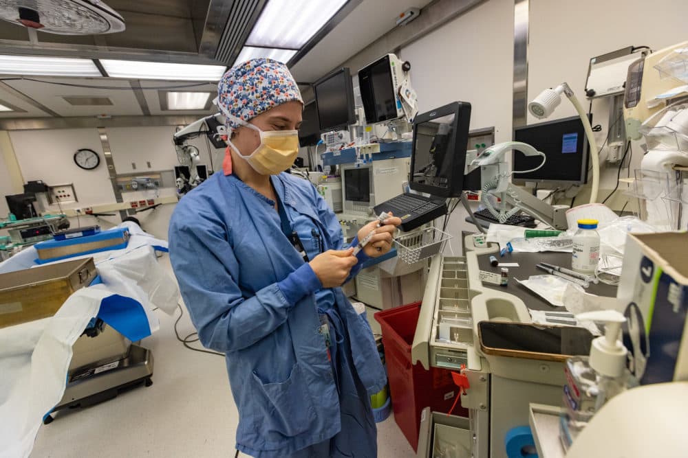 Training anesthesiology residents like Dr. Lillye Anderson now includes the climate context of her work in the OR at Massachusetts General Hospital. /(Jesse Costa/WBUR)