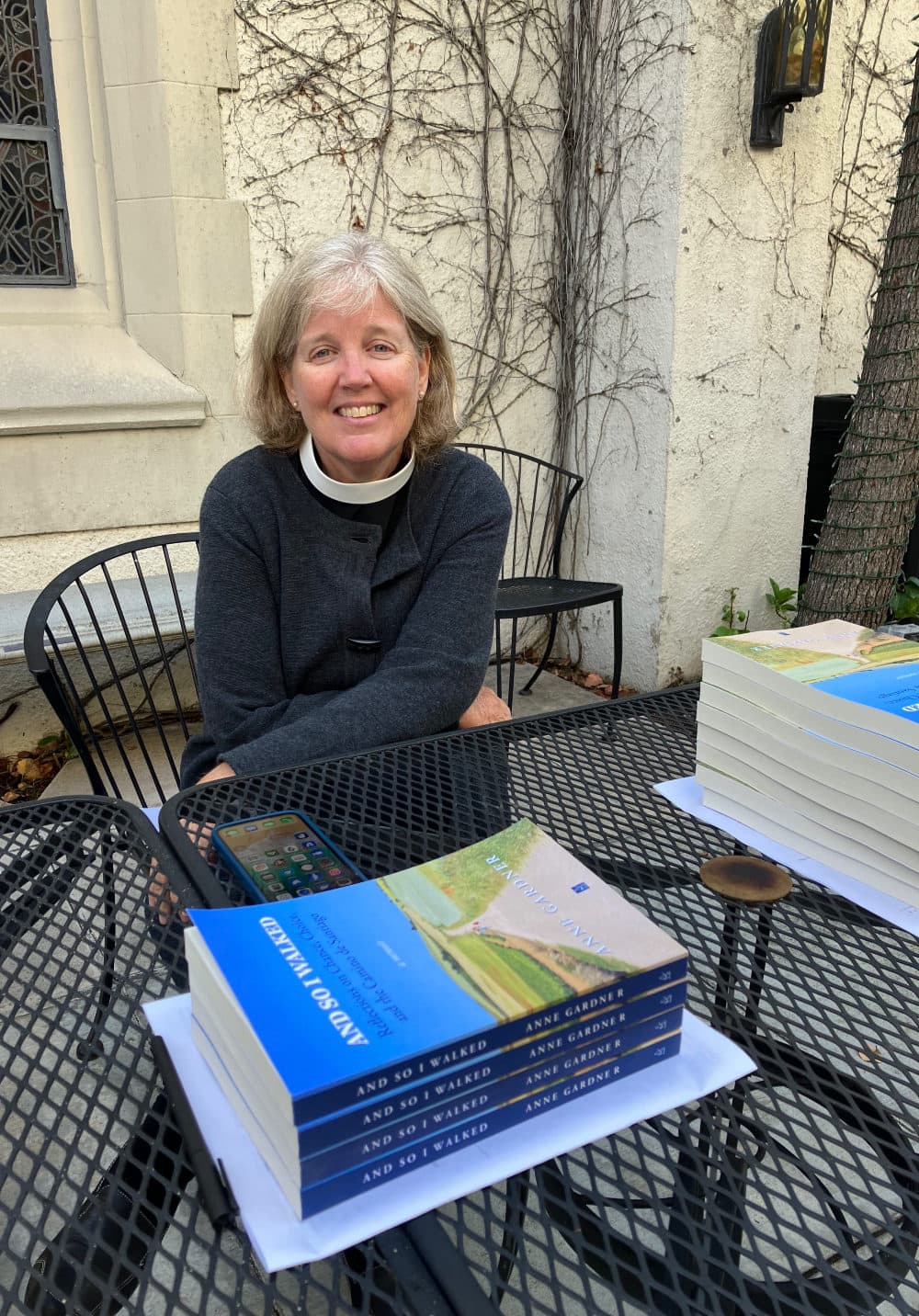 The author signing her book, "And So I Walked: Reflections on Chance, Choice, and the Camino de Santiago," after serving as guest preacher at St. James’ in-the-City Episcopal Church, Los Angeles, 2023. (courtesy Anne Gardner)