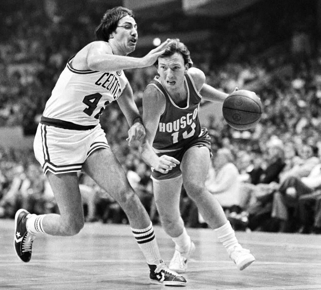 Boston Celtics Chris Ford (42), left, defends against Houston Rockets' Mike Dunleavy (10) during an NBA basketball playoff game in Boston in 1980. (Joan Rathe/AP)