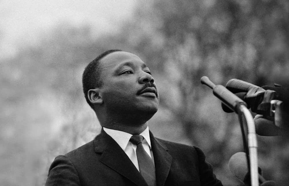 Dr. Martin Luther King, Jr. speaking before crowd of 25,000 Selma To Montgomery, Alabama civil rights marchers, in front of Montgomery, Alabama state capital building on March 25, 1965. (Photo by Stephen F. Somerstein/Getty Images)