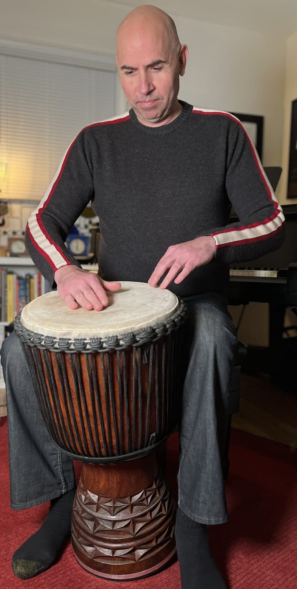 Mali’s Bambara people say the name of the djembe (pictured here played by Eric Shimelonis) comes from the saying "Anke djé, anke bé": "everyone gather together in peace.” (Courtesy of Rebecca Sheir)