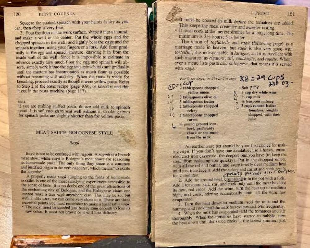 The author's 37-year-old copy of Marcella Hazan's "Classic Italian Cookbook,"  and the Bolognese recipe that requires a lot of chopping in the Cuisinart -- when multiplied by eight or ten.  (Courtesy Naomi Schalit)