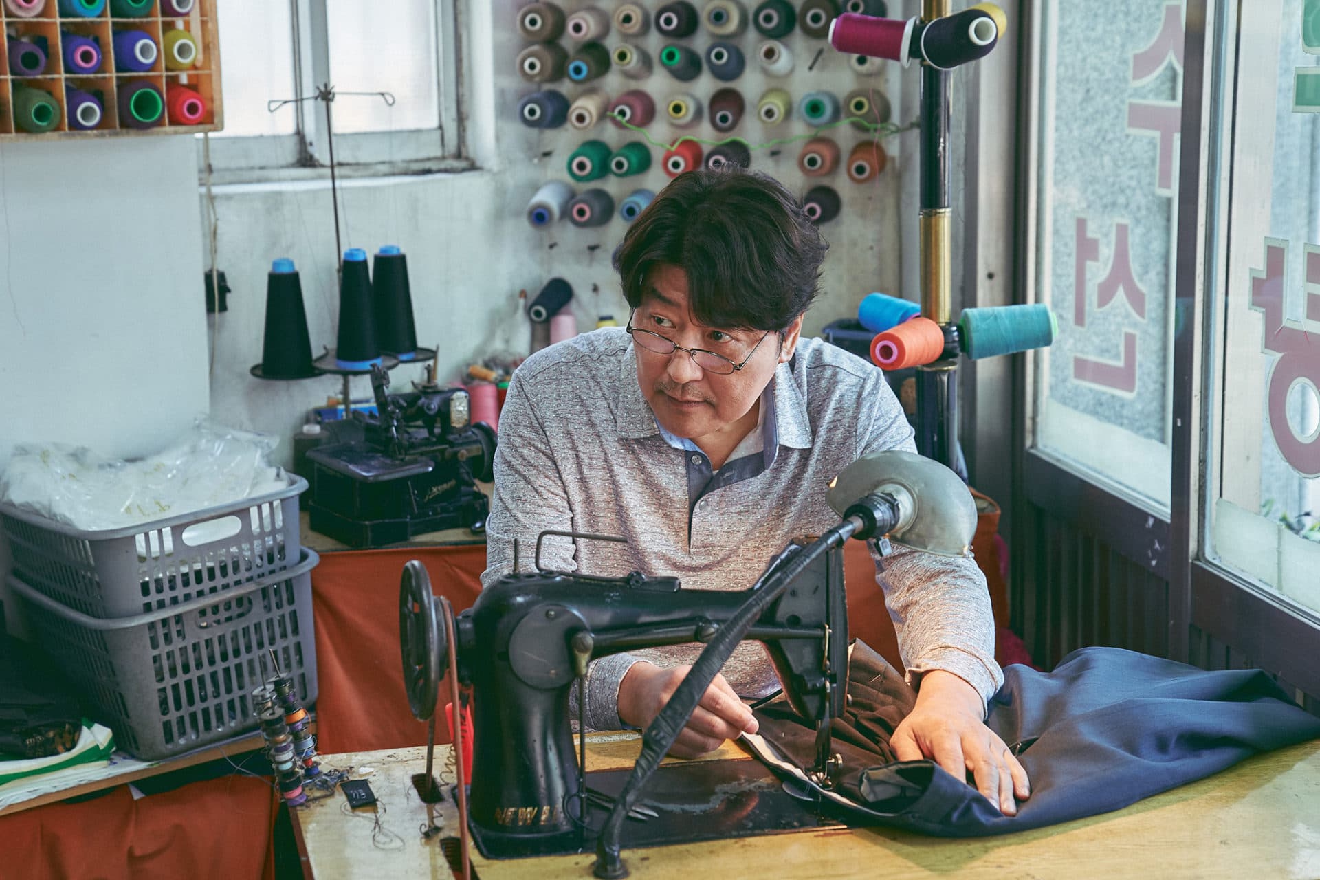 Song Kang Ho as Sang-hyeon, a floundering laundry shop owner, in &quot;Broker.&quot; (Courtesy NEON)