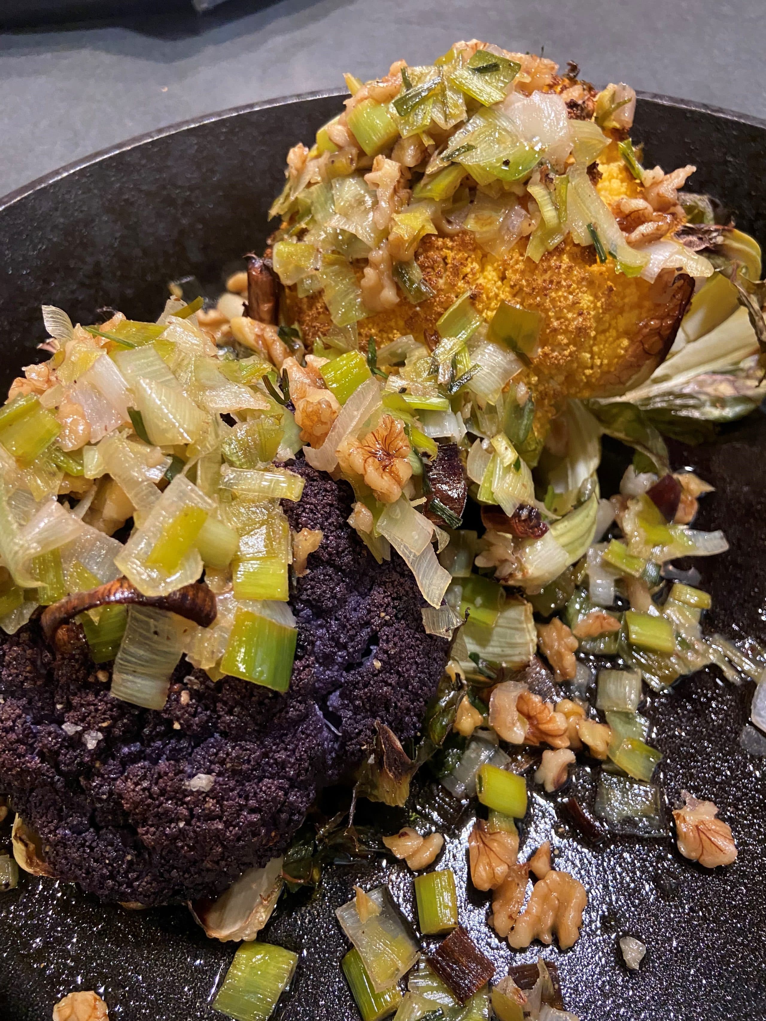 Whole roasted cauliflower with walnuts, pomegranates and lemon. (Kathy Gunst/Here & Now)