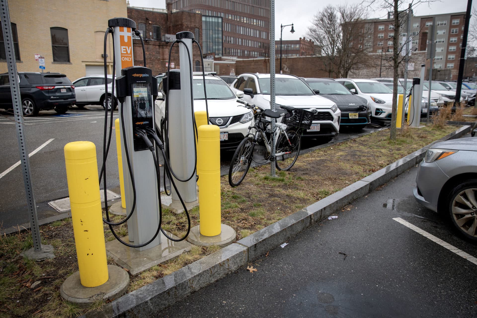 Charger in a parking lot in Roxbury. (Credit: Robin Lubbock/WBUR)