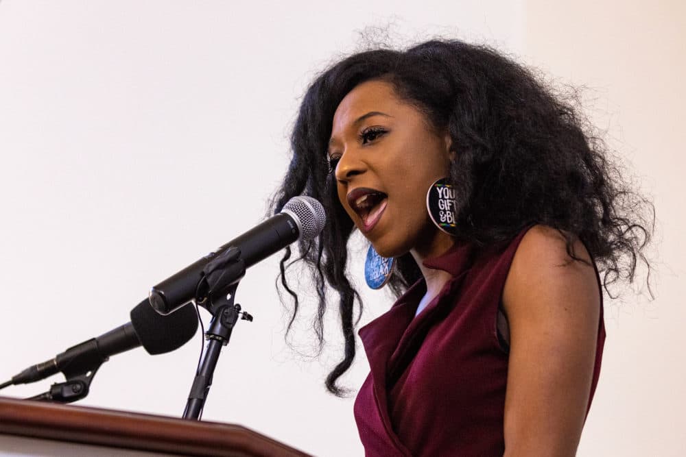 Newly appointed member of the task force, Carrie Mays, a UMass Boston student and youth leader with Teen Empowerment, speaks during the announcement of the newly formed Reparations Task Force, created to study the lasting impact of slavery in Boston at the Museum of African American History. (Jesse Costa/WBUR)