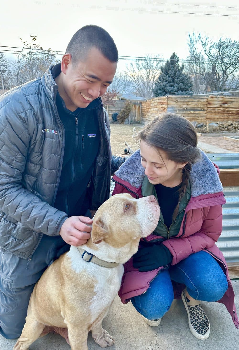 Kyle Chu and Sophia Sincevich and their rescue dog, Bendu. Bendu is estimated to be 10 years old, and has been diagnosed with cancer, and expected to live only six months to a year. (Stina Sieg/CPR)