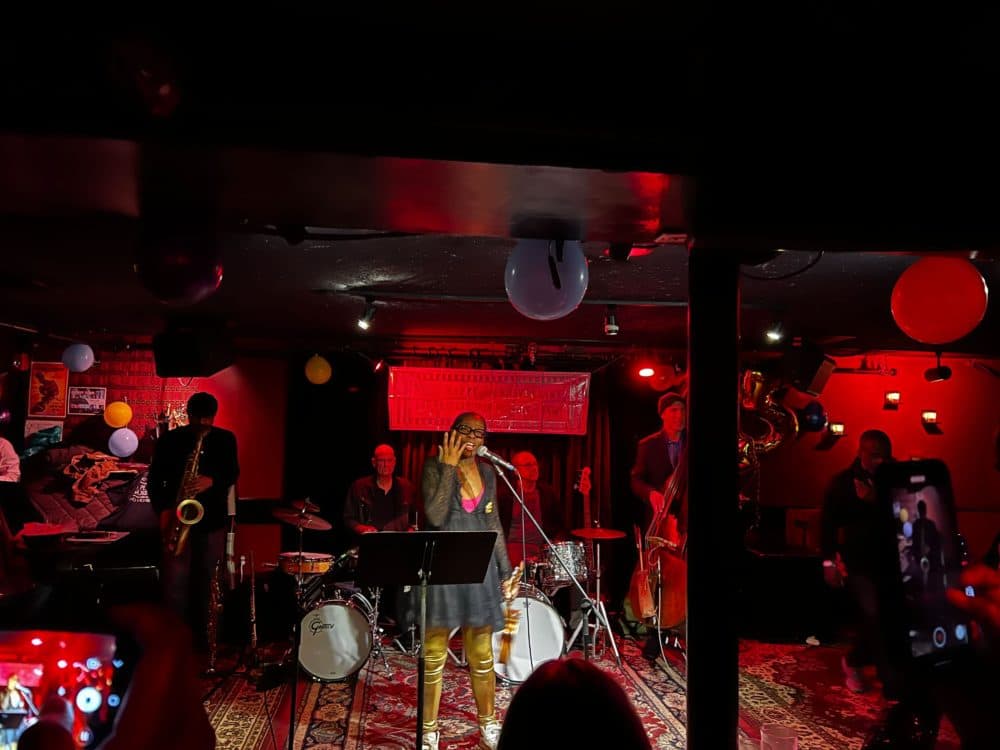 Iyeoka Okoawo performing at the Lizard Lounge Poetry Jam. (Cristela Guerra/WBUR)