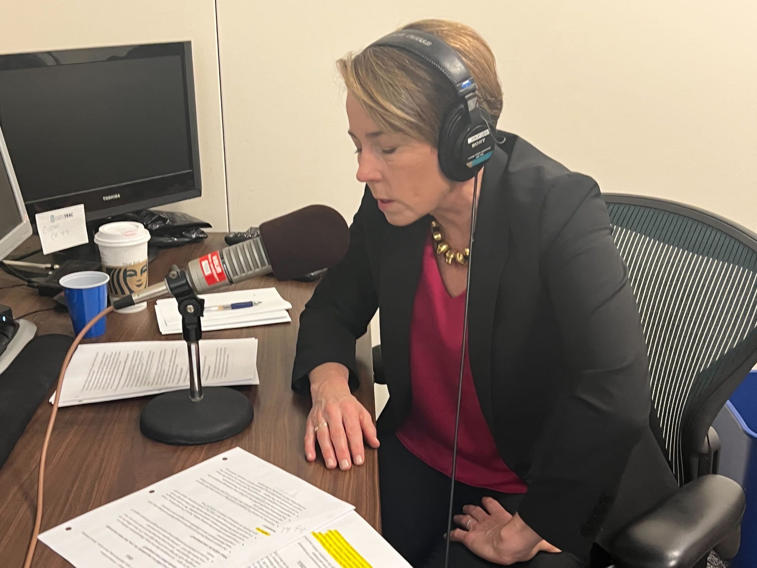 Gov. Maura Healey speaking in WBUR's State House bureau. (Steve Brown/WBUR)