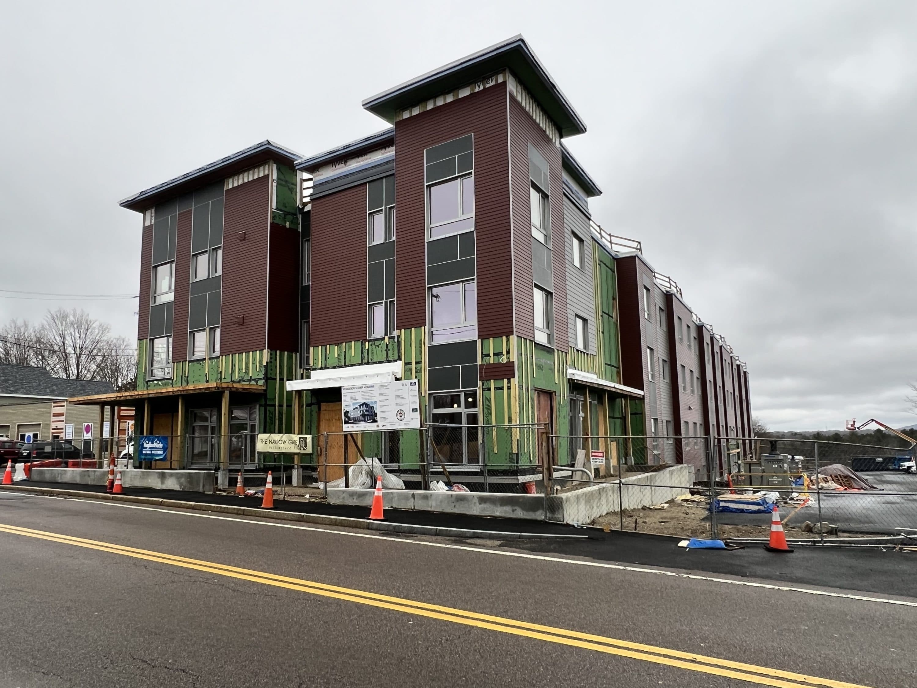 A 72-unit senior housing project now under construction in Holbrook has a smaller ecological footprint than traditional buildings. The green technologies are funded in part by the Massachusetts Clean Energy Center, which stands to see increased funding in Gov. Maura Healey's first budget recommendation. (Steve Brown/WBUR)