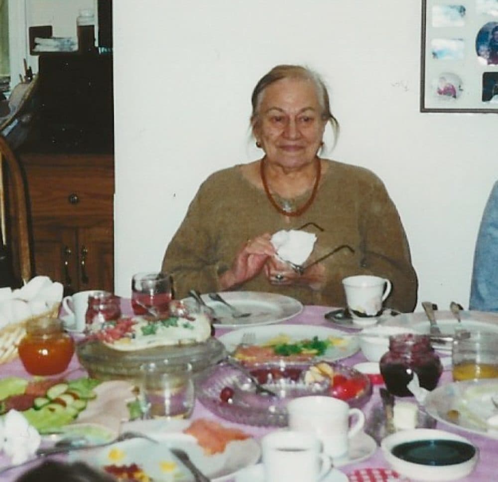 The author's great-grandmother presiding over a family meal. (Courtesy Anastasya Partan)