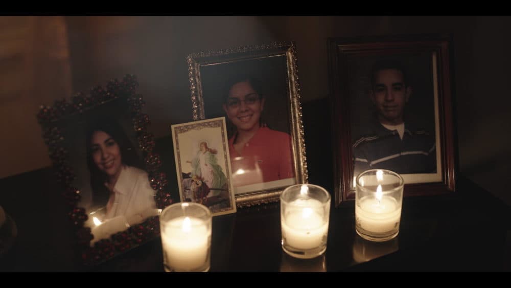 The parents of Santos, Yalitza and Felicia Rosario, displayed pictures of their children, adorned by candles, for all the years that the three were involved with cult-leader Larry Ray. Courtesy of Hulu)