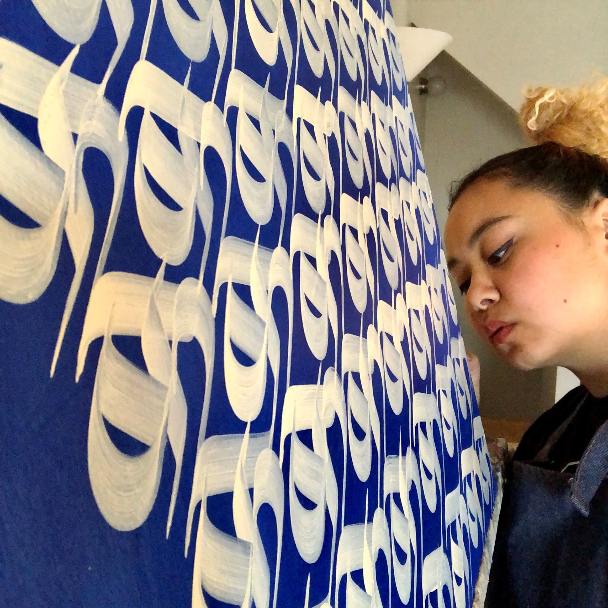 Artist Sneha Shrestha working on "Home 416." (Courtesy of the artist)