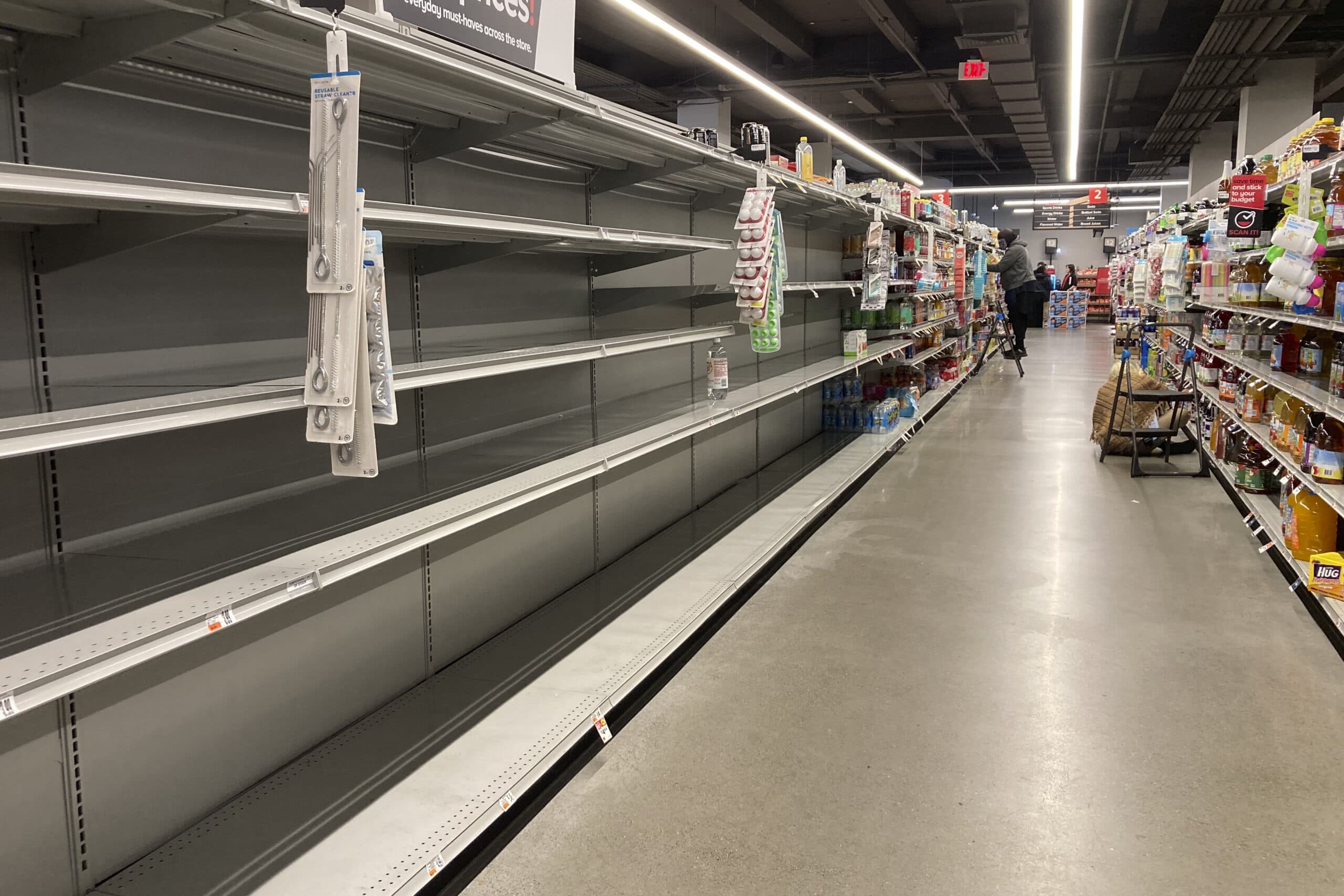 Shelves stand empty of bottled water following a chemical spill into the Delaware River upstream from Philadelphia. (Matt Rourke/AP)