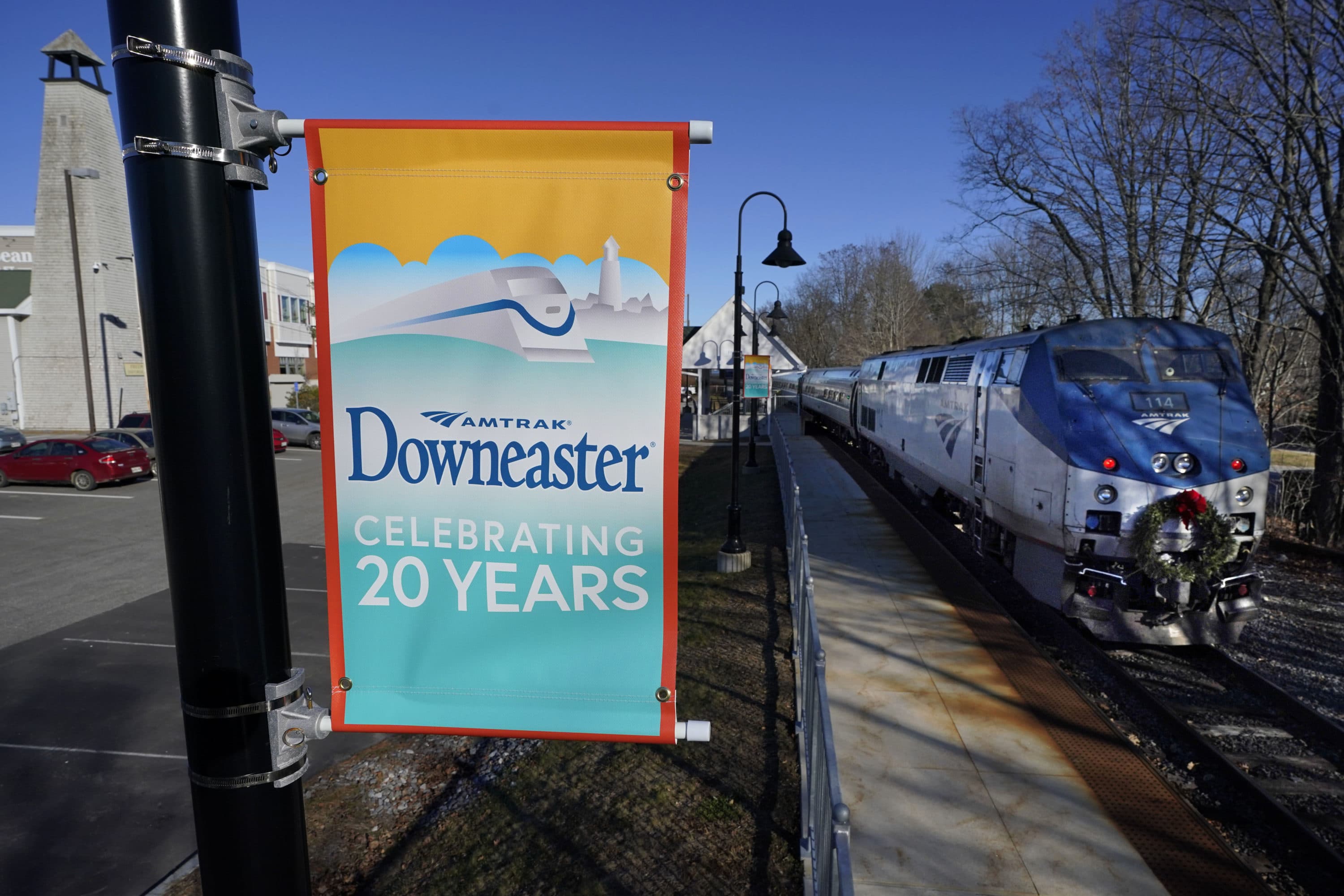 The Amtrak Downeaster passenger train pulls out of the station, Tuesday, Dec. 14, 2021, in Freeport, Maine. (Robert F. Bukaty/AP)