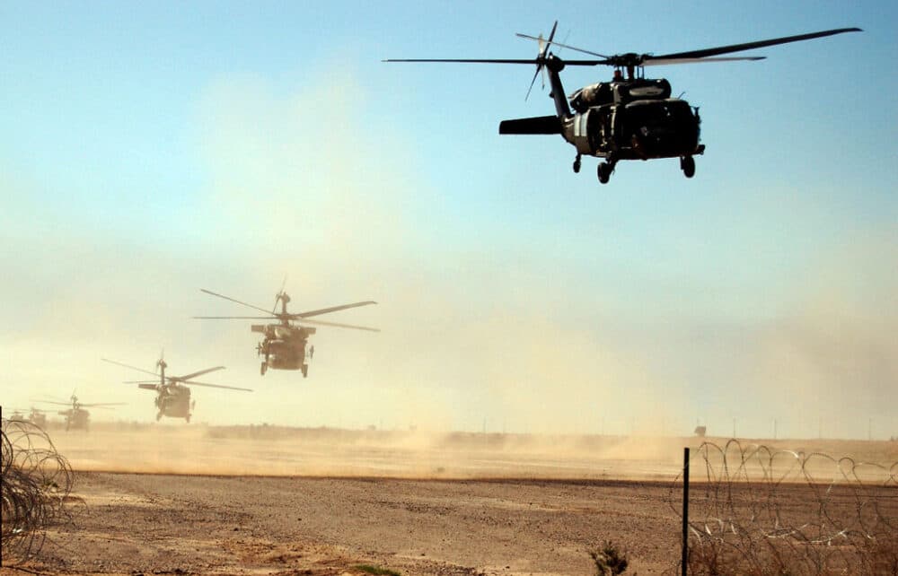 A picture released by U.S. Army March 16, 2006 shows U.S. helicopters fly from its military base during during an assault Operation Swarmer targeting insurgent strongholds north of Baghdad. (Sgt. First Class Antony Jose/U.S. Army via Getty Images)