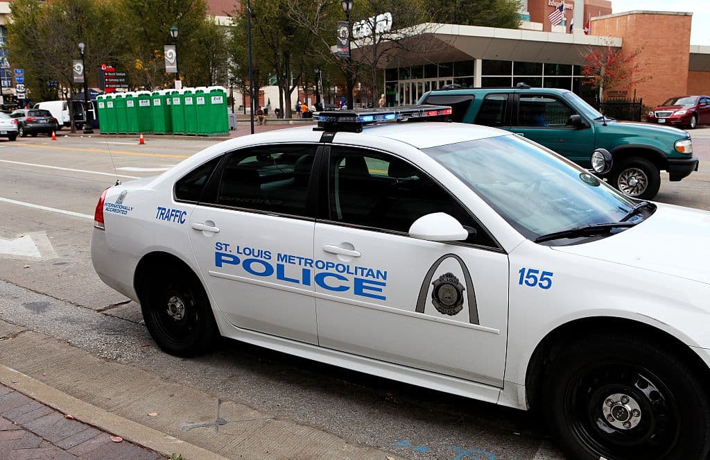 A St. Louis police vehicle sits outside the Edward Jones Dome in St. Louis, Missouri on November 15, 2015. (Photo By Raymond Boyd/Getty Images)