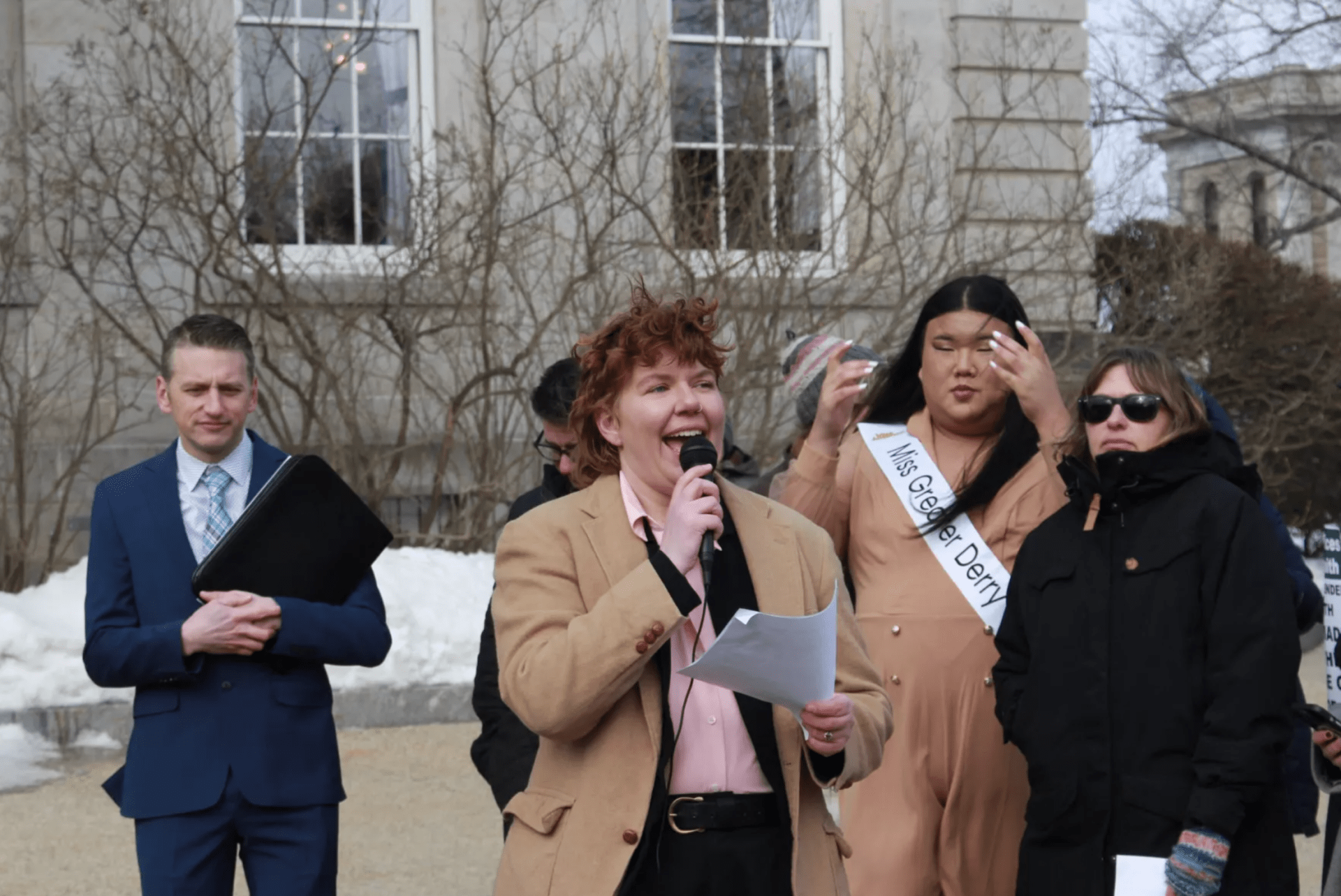 Linds Jakows, founder of the group 603 Equality, speaks at a rally opposing several bills dealing with the rights of LGBTQ+ youth at the State House, March 7. (Zoey Knox/NHPR)