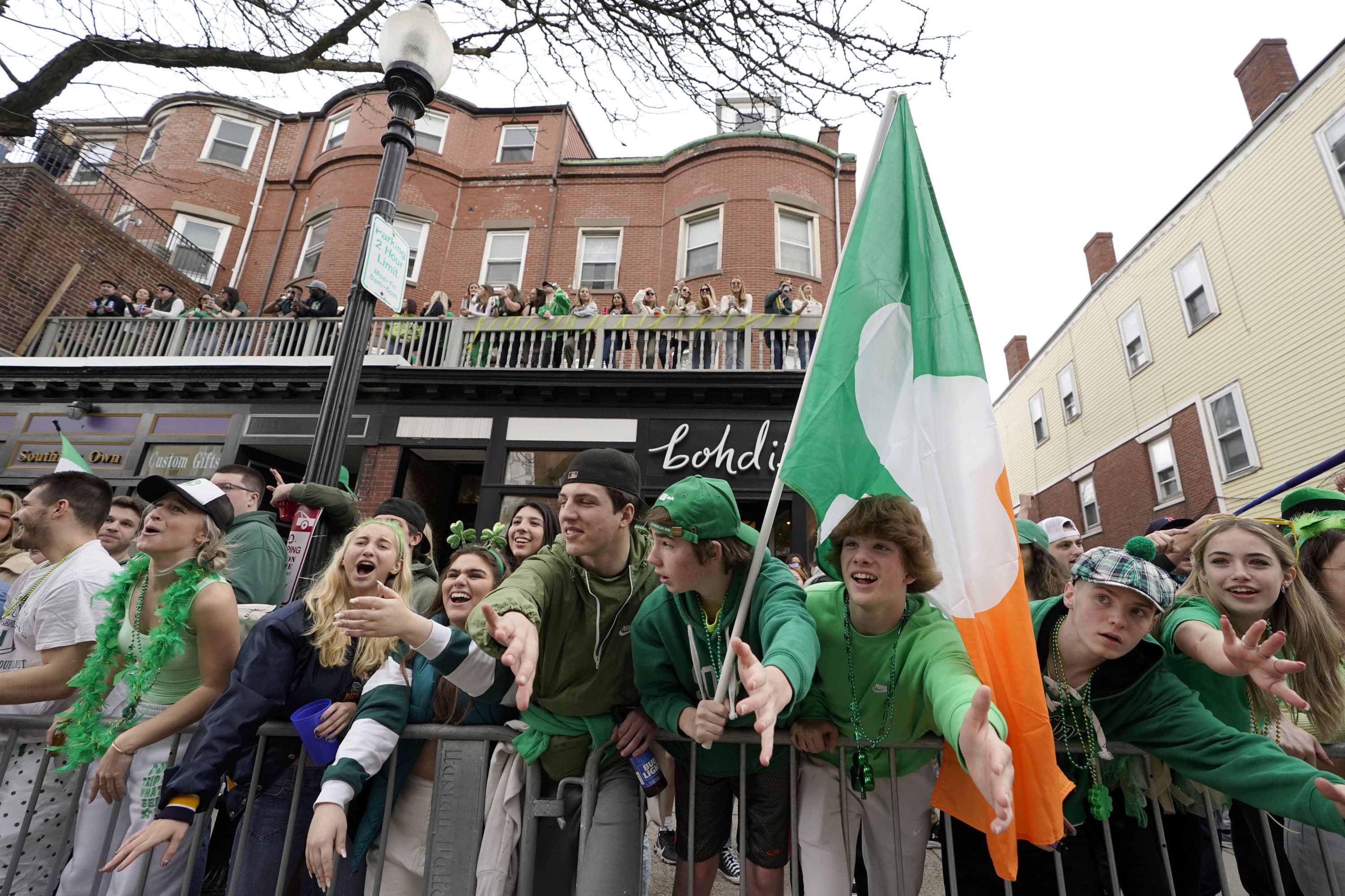 Spectators watch last year's St. Patrick's Day parade in South Boston. (AP Photo/Steven Senne)