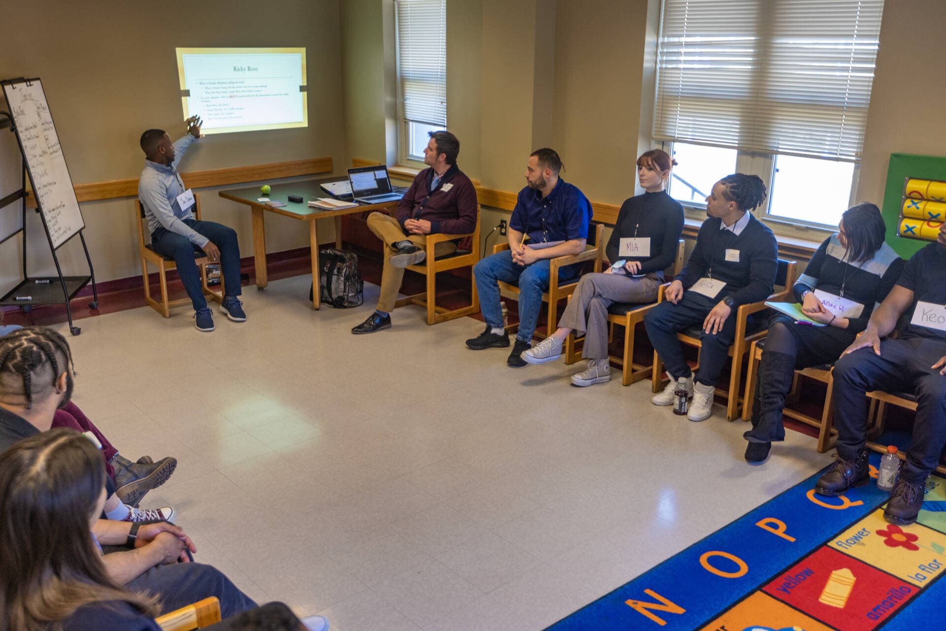 A class with School of Reentry participants and Brandies students at the Boston Pre-Release Center. (Jesse Costa/WBUR)