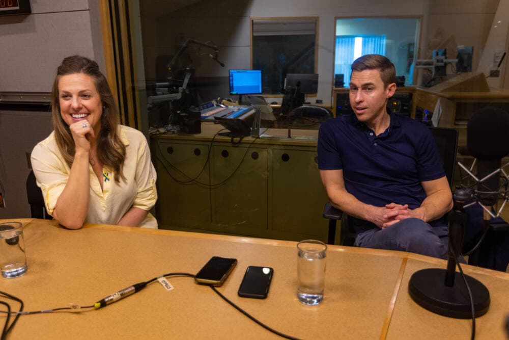 Jess Kensky and Patrick Downes speaking with Lisa Mullins at the WBUR studios. (Jesse Costa/WBUR)