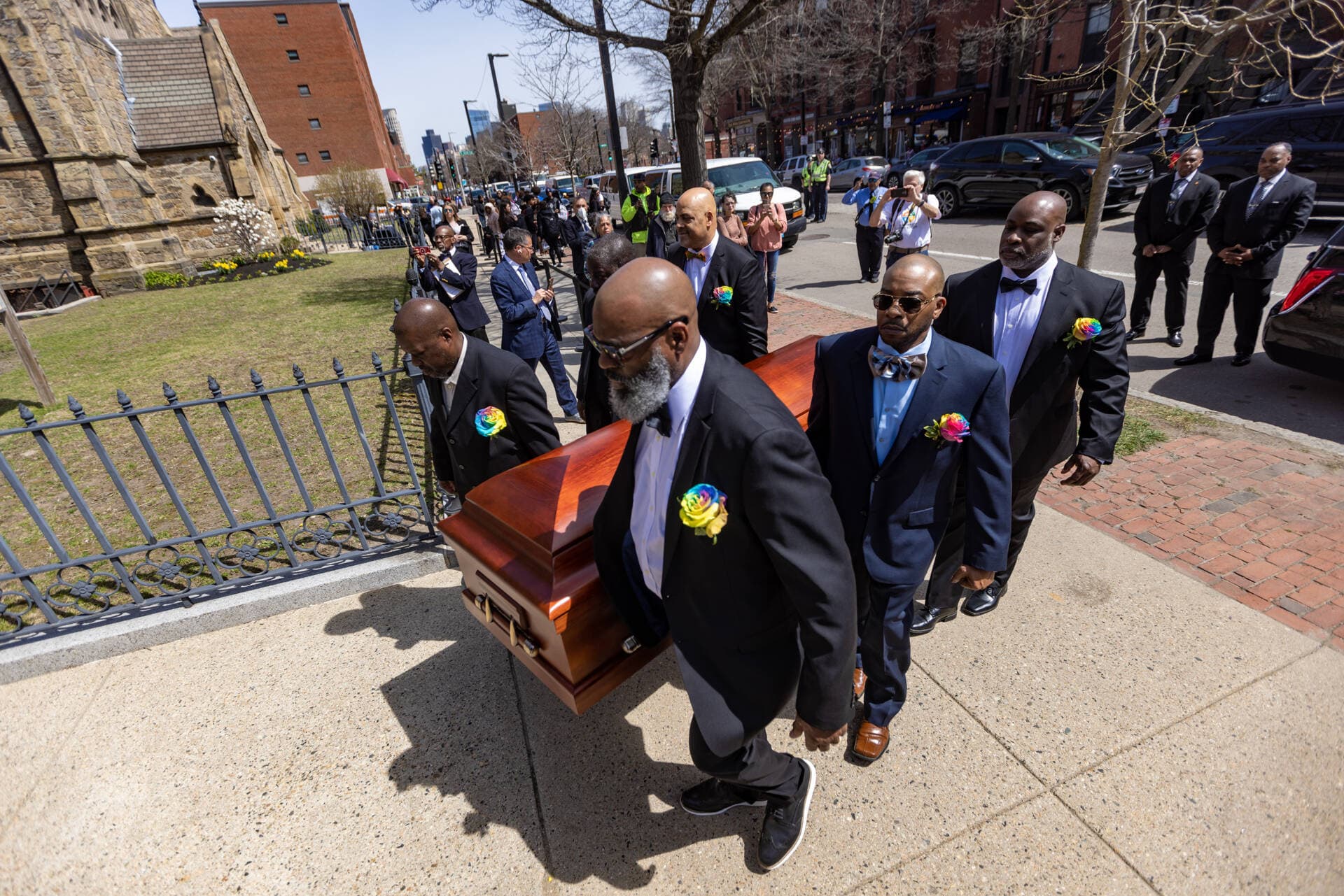Pallbearers carry the casket of Mel King into the Union United Methodist Church in the South End. (Jesse Costa/WBUR)