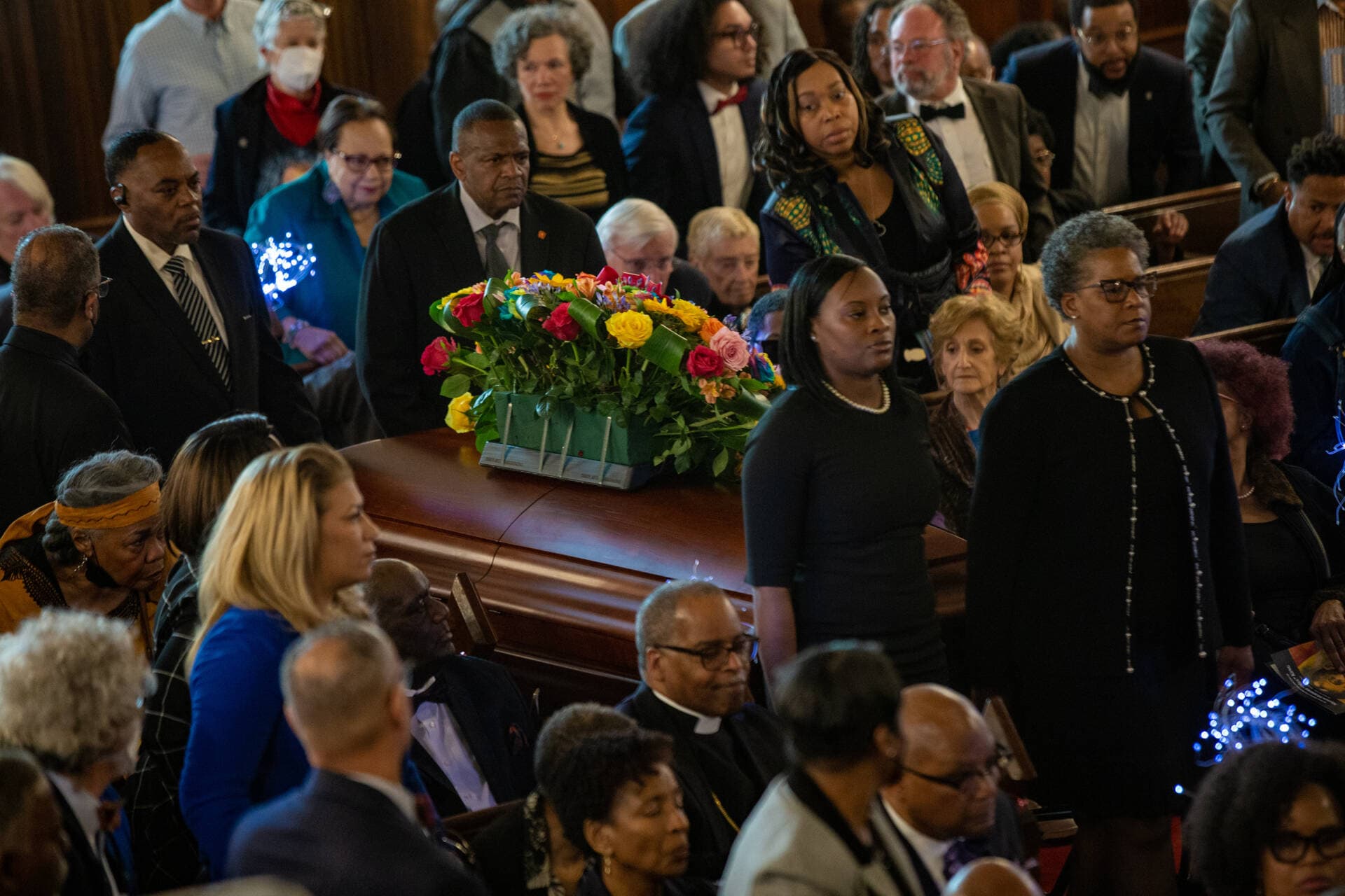 Pallbearers place the casket of Mel King down the aisle during funeral service at Union United Methodist Church in the South End. (Jesse Costa/WBUR)