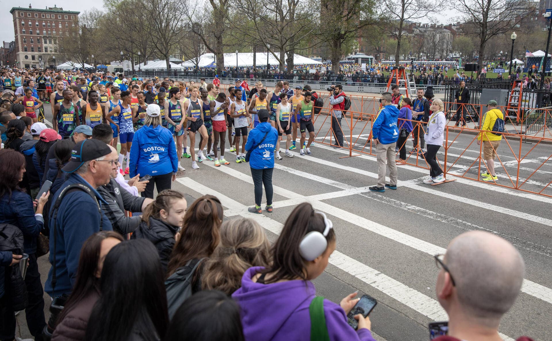 Runners line up on the Charles Street starting line for the 5K race. (Robin Lubbock/WBUR)