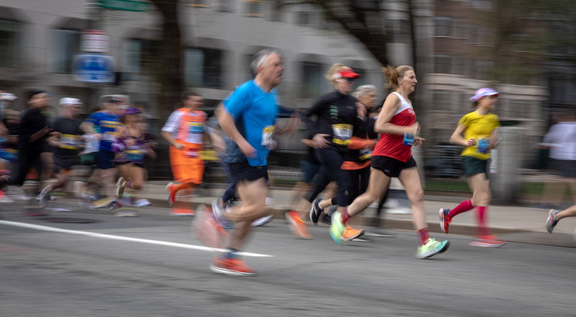 Runners make their way along Arlington Street. (Robin Lubbock/WBUR)