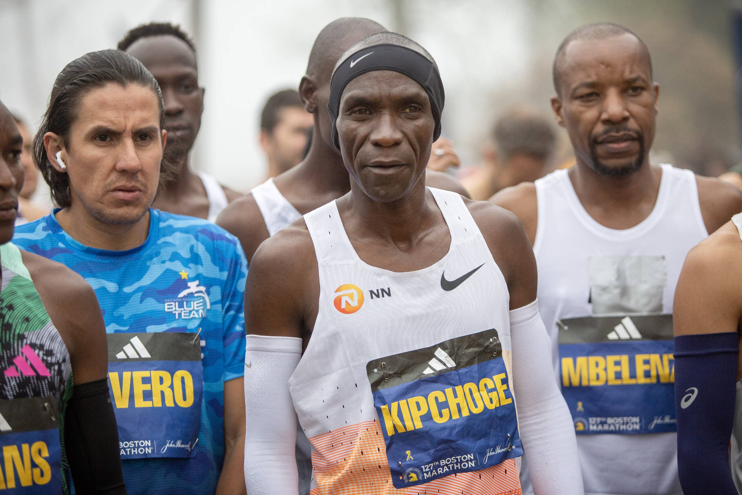 Eliud Kipchoge lines up on the starting line for the start of the men's division. (Robin Lubbock/WBUR)
