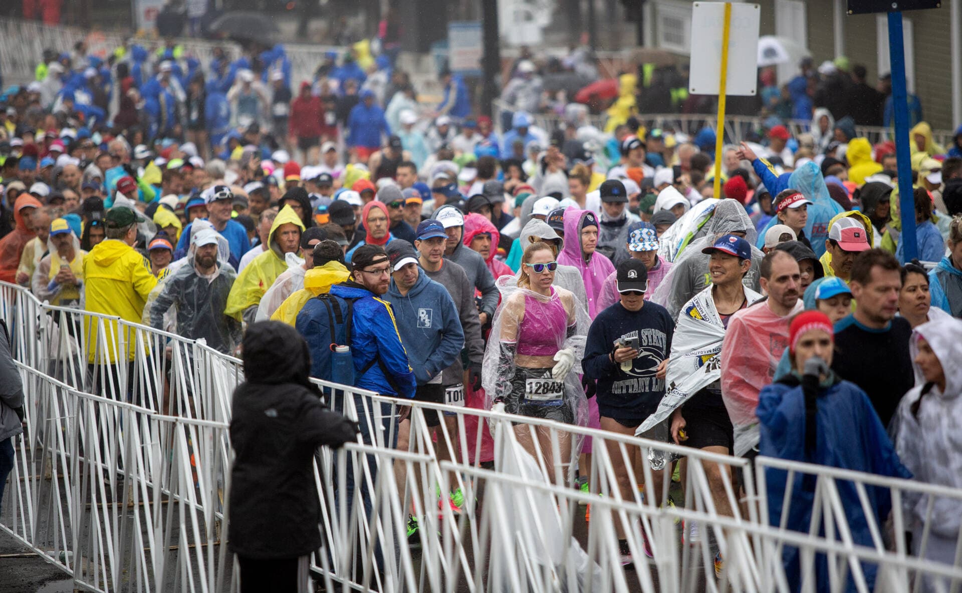 Runners make their way to the start of the Boston Marathon. (Robin Lubbock/WBUR)
