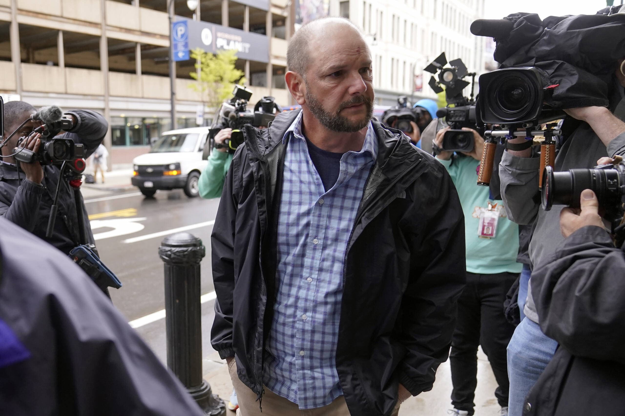 Jack Michael Teixeira, center, father of Massachusetts Air National Guardsman Jack Teixeira arrives at federal court, April 27, in Worcester, Massachusetts. (Steven Senne/AP)