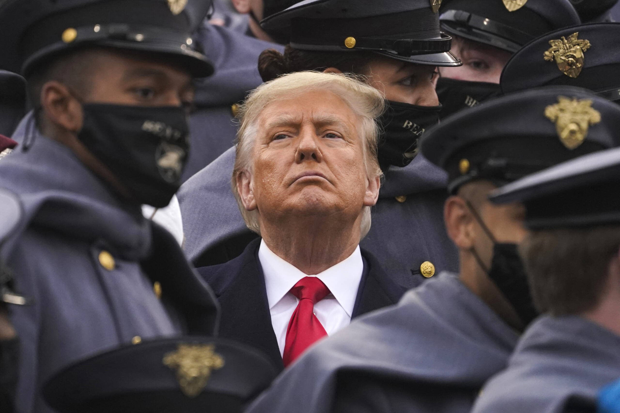 Donald Trump is surrounded by Army cadets. (AP Photo/Andrew Harnik)