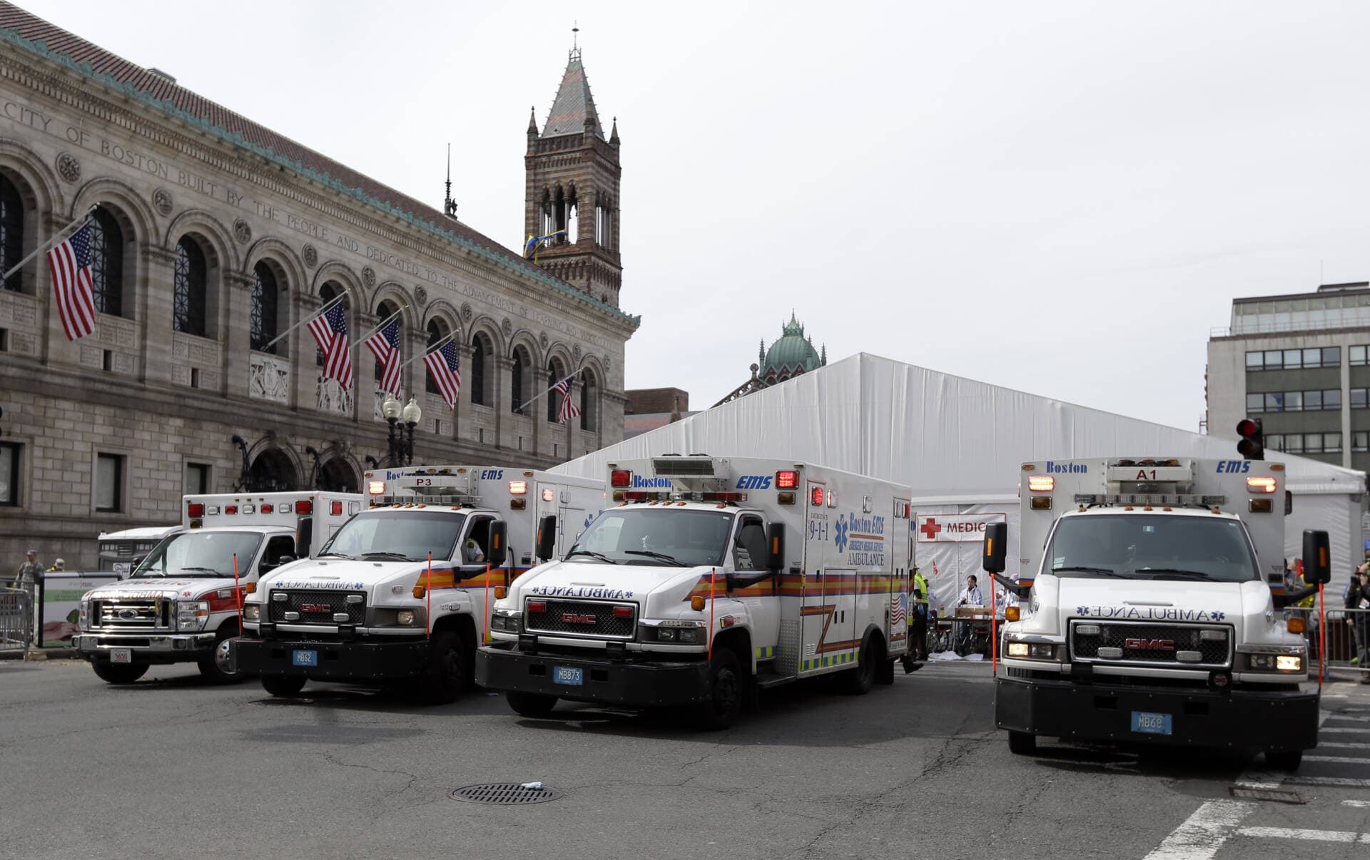 Ambulances sit outside the medical tent at the Boston Marathon finish area in the aftermath of two blasts at the 2013 Boston Marathon finish area. (Elise Amendola/AP)