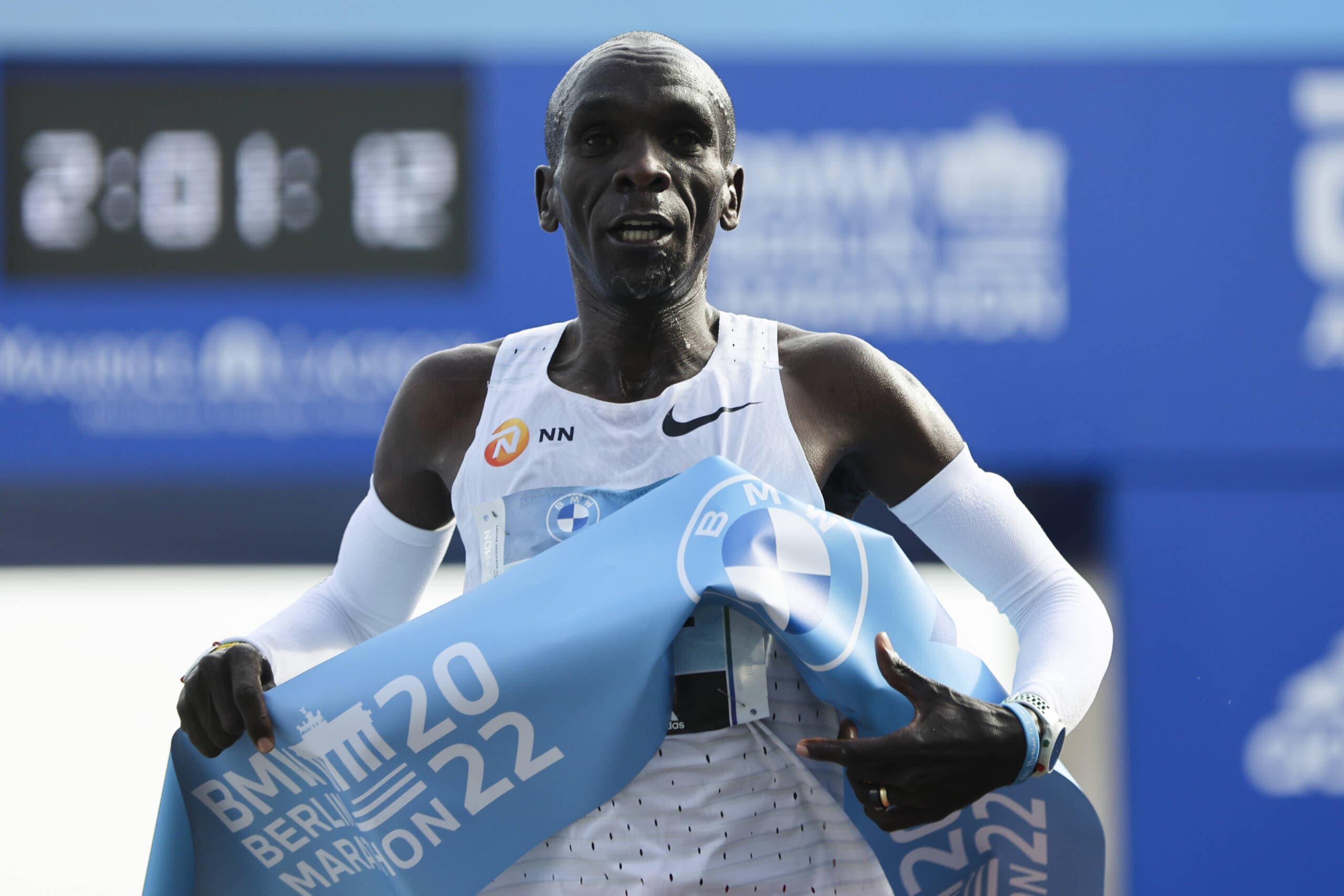 Kenya's Eliud Kipchoge crosses the line to win the Berlin Marathon on Sept. 25, 2022. (Christoph Soeder/AP)