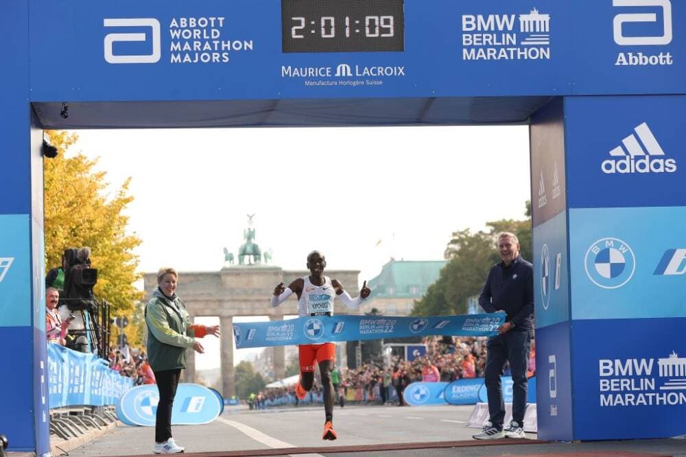 Eliud Kipchoge of Kenya crosses the finish line of the 2022 BMW Berlin-Marathon in a new Wolrd Record Time of 2:01:09 h on September 25, 2022 in Berlin, Germany. (Alexander Hassenstein/Getty Images)