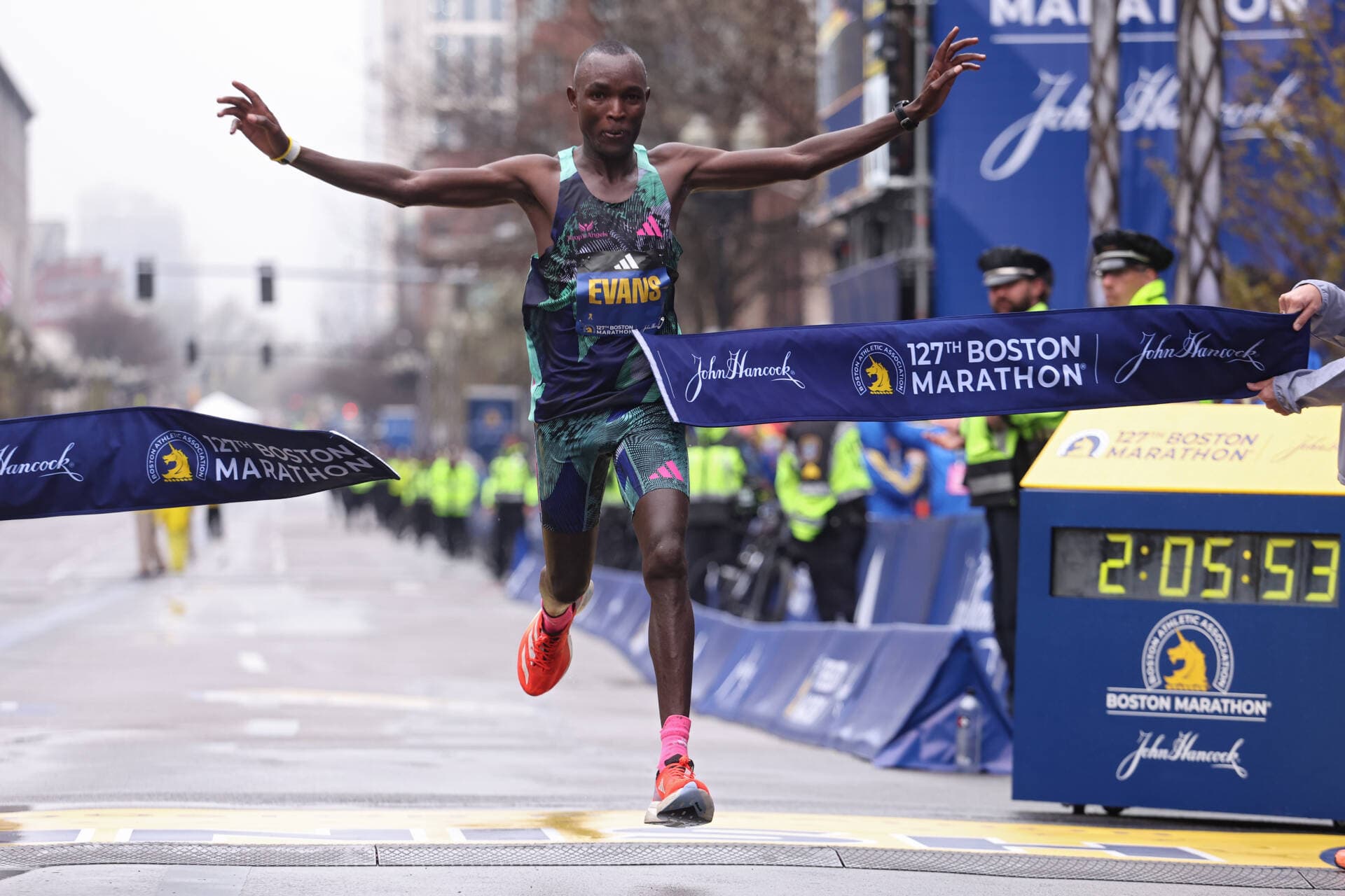 Evans Chebet, of Kenya, crosses the finish line and takes first place in the professional Men's Division during the 127th Boston Marathon on April 17, 2023. (Maddie Meyer/Getty Images)