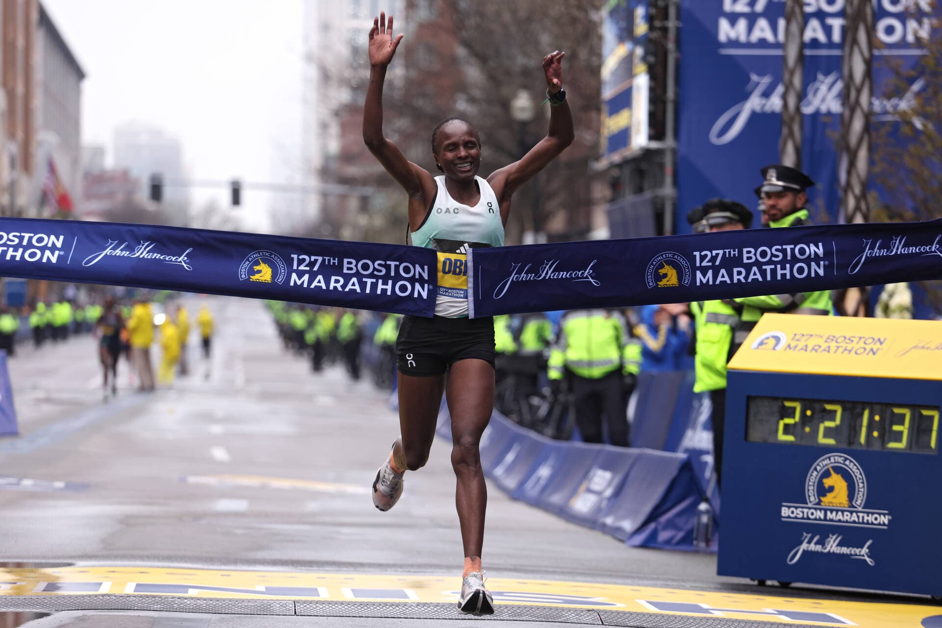 Hellen Obiri, of Kenya, crosses the finish line and takes first place in the professional Women's Division during the 127th Boston Marathon on April 17, 2023. (Maddie Meyer/Getty Images)