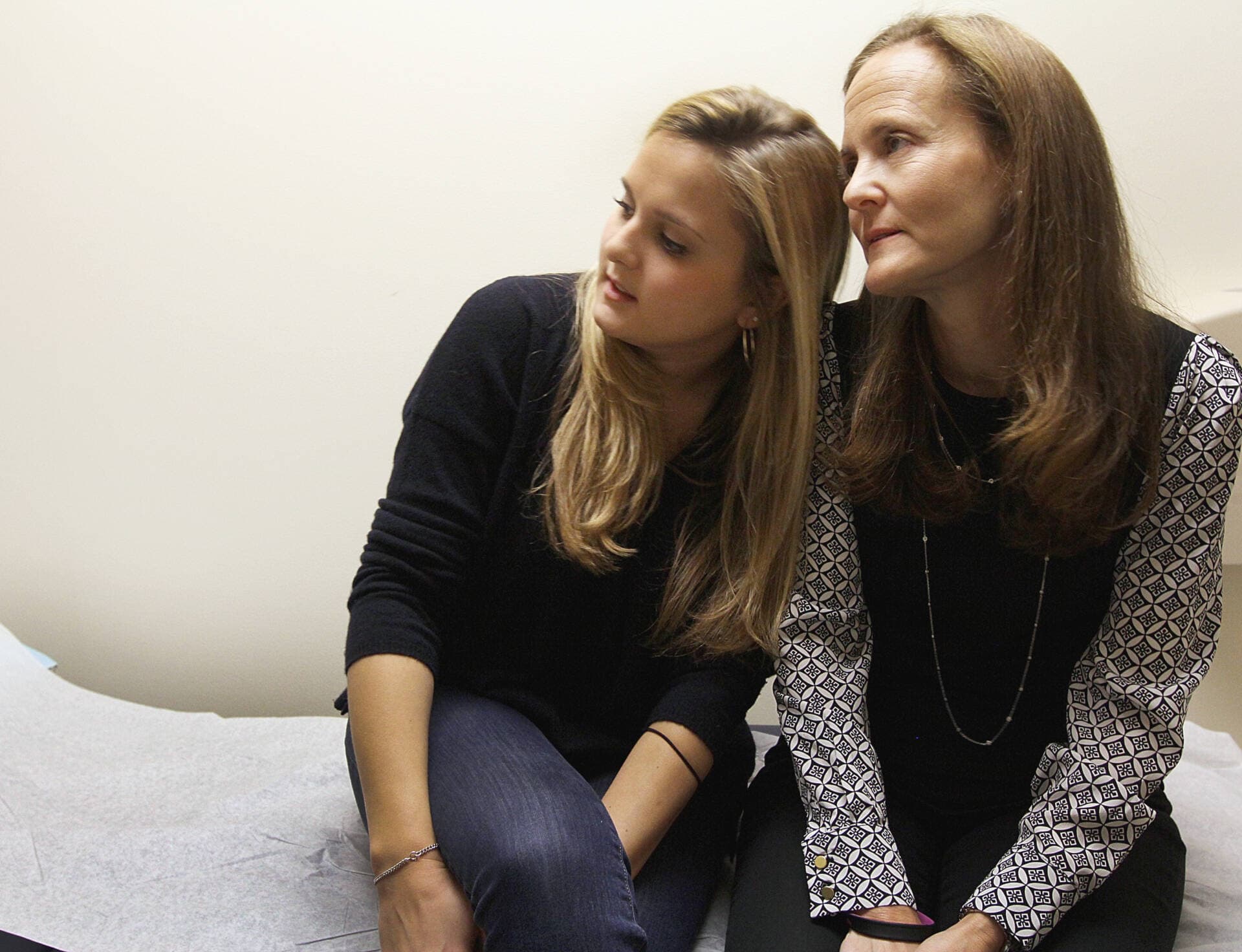 Boston Marathon bombings survivor Gillian Reny and mother Audrey Epstein Reny had a quiet moment during an appointment at Brigham and Women's Hospital in Boston, Tuesday, February 18, 2014. (Wendy Maeda/The Boston Globe via Getty Images)