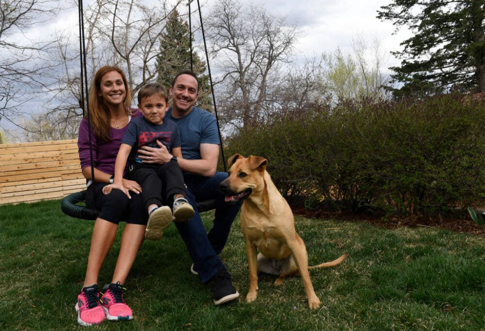 Kara Goucher, left, her husband Adam, right, and their 6 year old son Colt are photographed with their dog Freya at their home on March 3, 2017 near Boulder, Colorado. (Helen H. Richardson/The Denver Post via Getty Images)