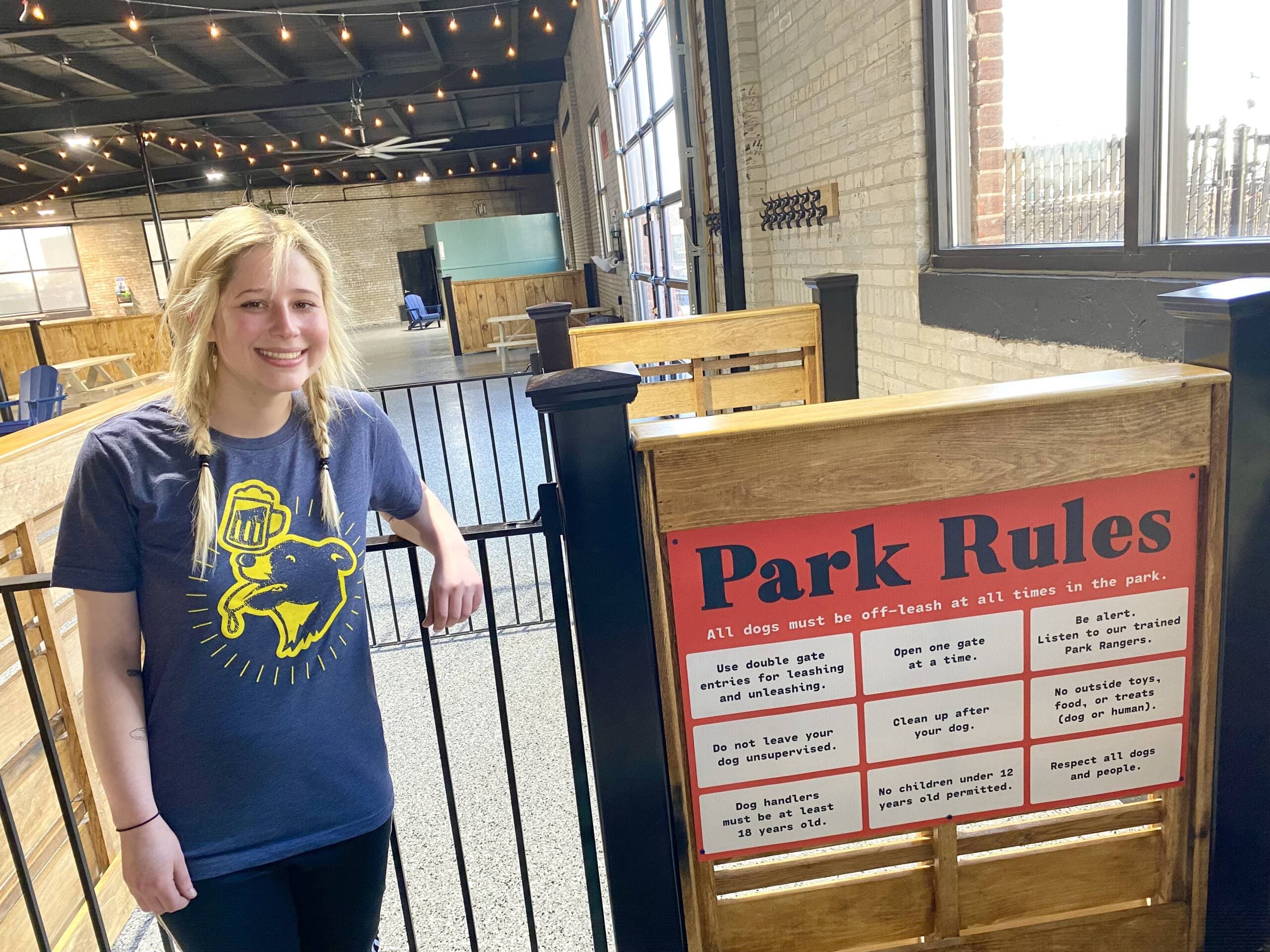Dog care manager Carly Beckwith has been working with dogs for more than five years and said Park-9 is a "dream come true." (Andrea Shea/WBUR)