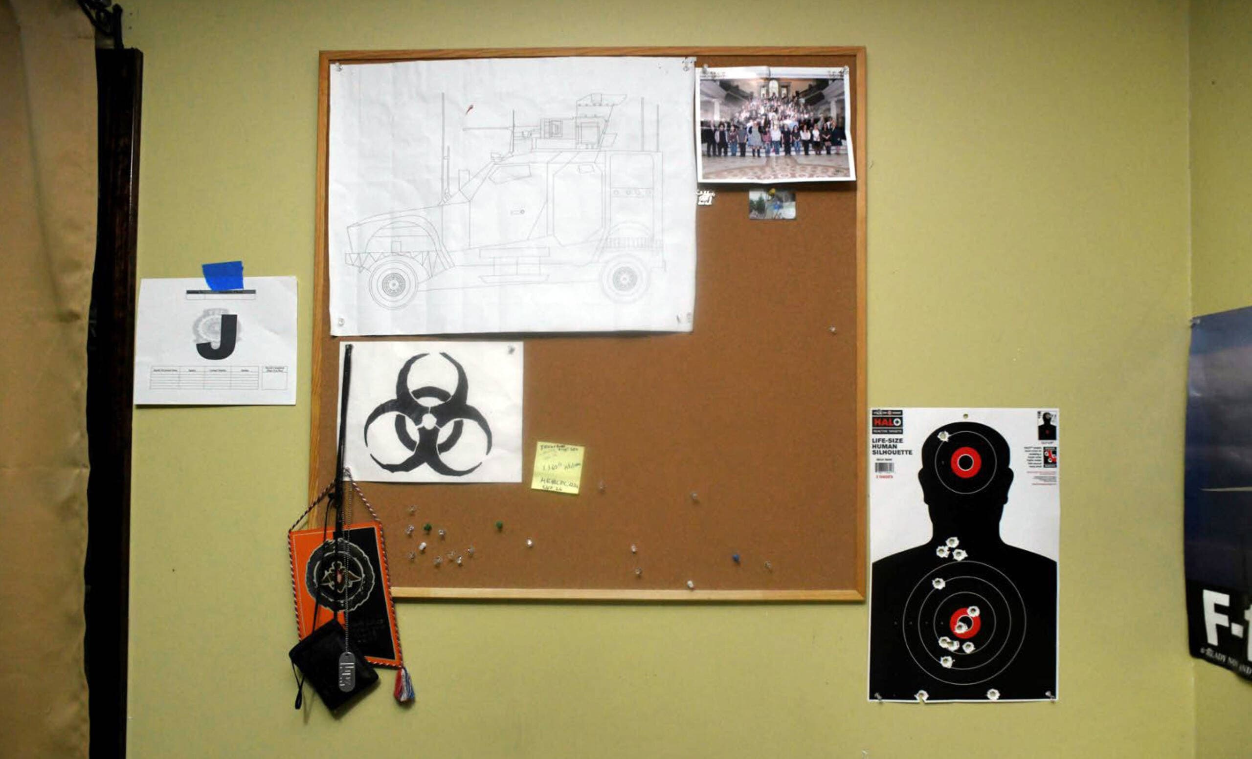 This image contained in a Justice Department motion for continued pretrial detention of Jack Teixeira, shows his room at his father's home in North Dighton, Mass. Prosecutors said Teixeira kept an arsenal of weapons and said on social media that he would like to kill a "ton of people." (Justice Department via AP)