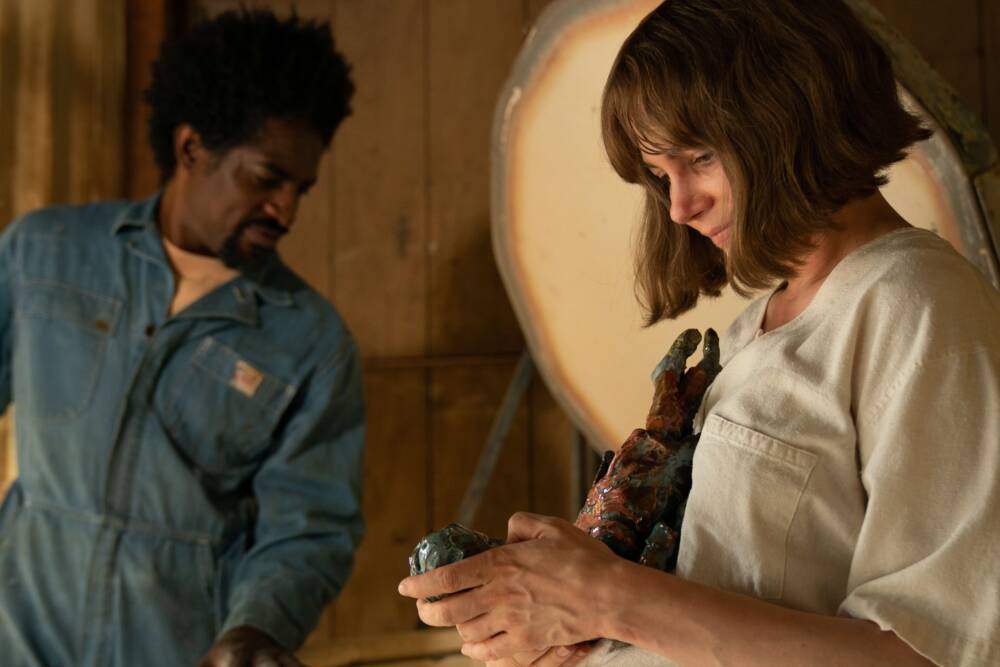André 3000 and Michelle Williams in "Showing Up." (Courtesy A24)