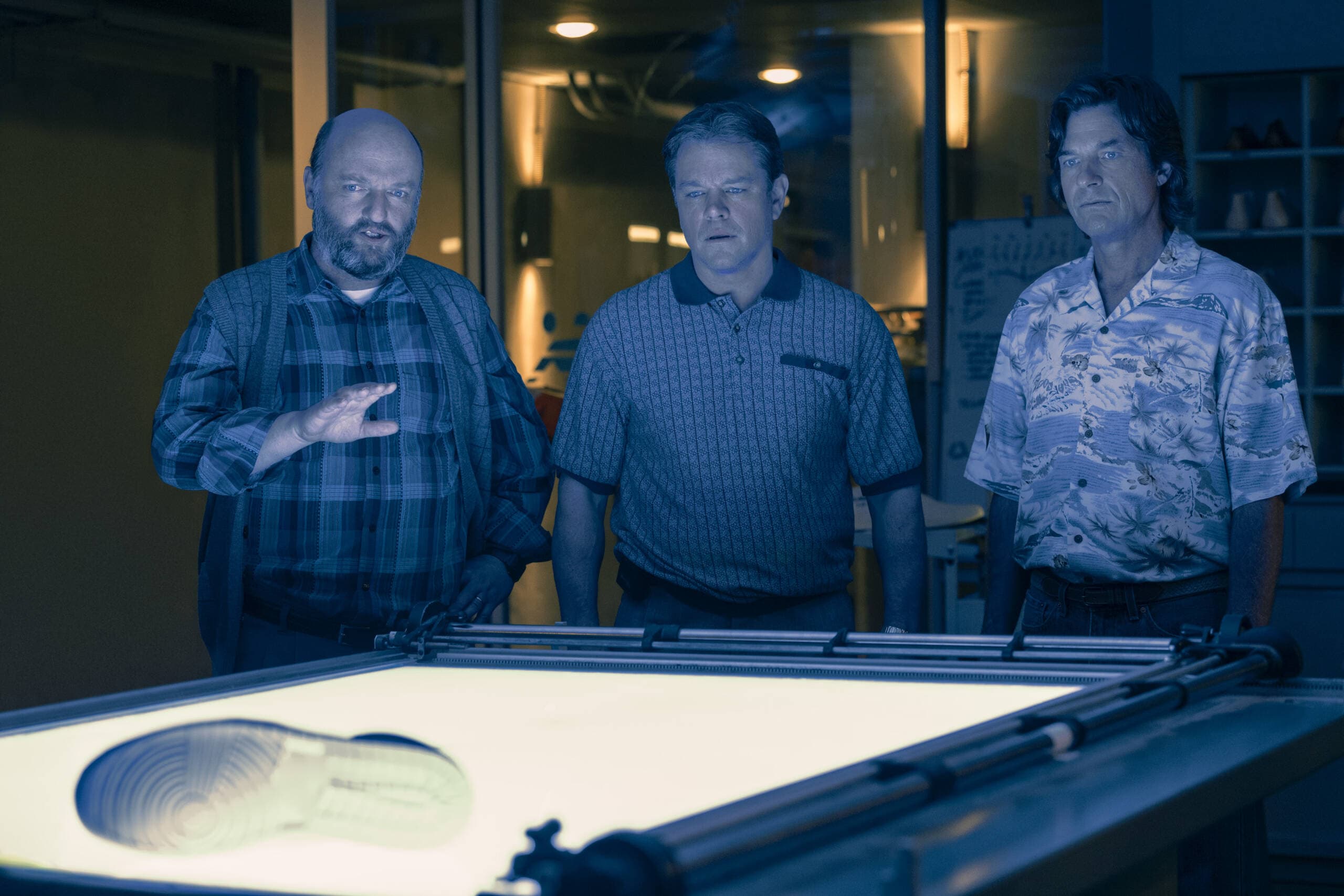Matthew Maher as Peter Moore, Matt Damon as Sonny Vaccaro and Jason Bateman as Rob Strasser in "Air." (Courtesy Amazon Studios; photo by Ana Carballosa)