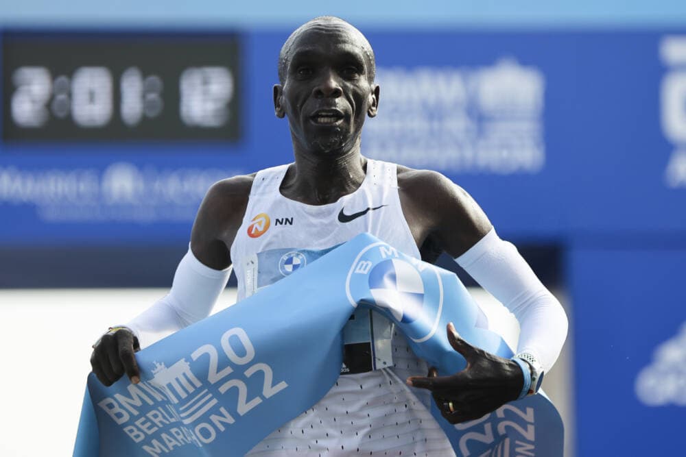 Kenya's Eliud Kipchoge crosses the line to win the Berlin Marathon in 2022. A 38-year-old who has been collecting marathon victories since 2013, Kipchoge is making his Boston Marathon debut Monday. (Christoph Soeder/AP)