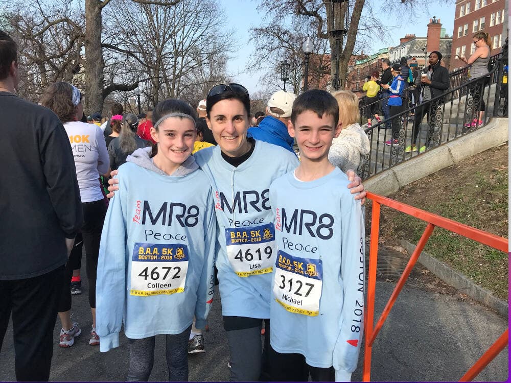 Lisa Simmons with two of her children, running the 2018 Boston Marathon 5K for Team MR8 and the Martin Richard Foundation. (Courtesy Lisa Simmons)