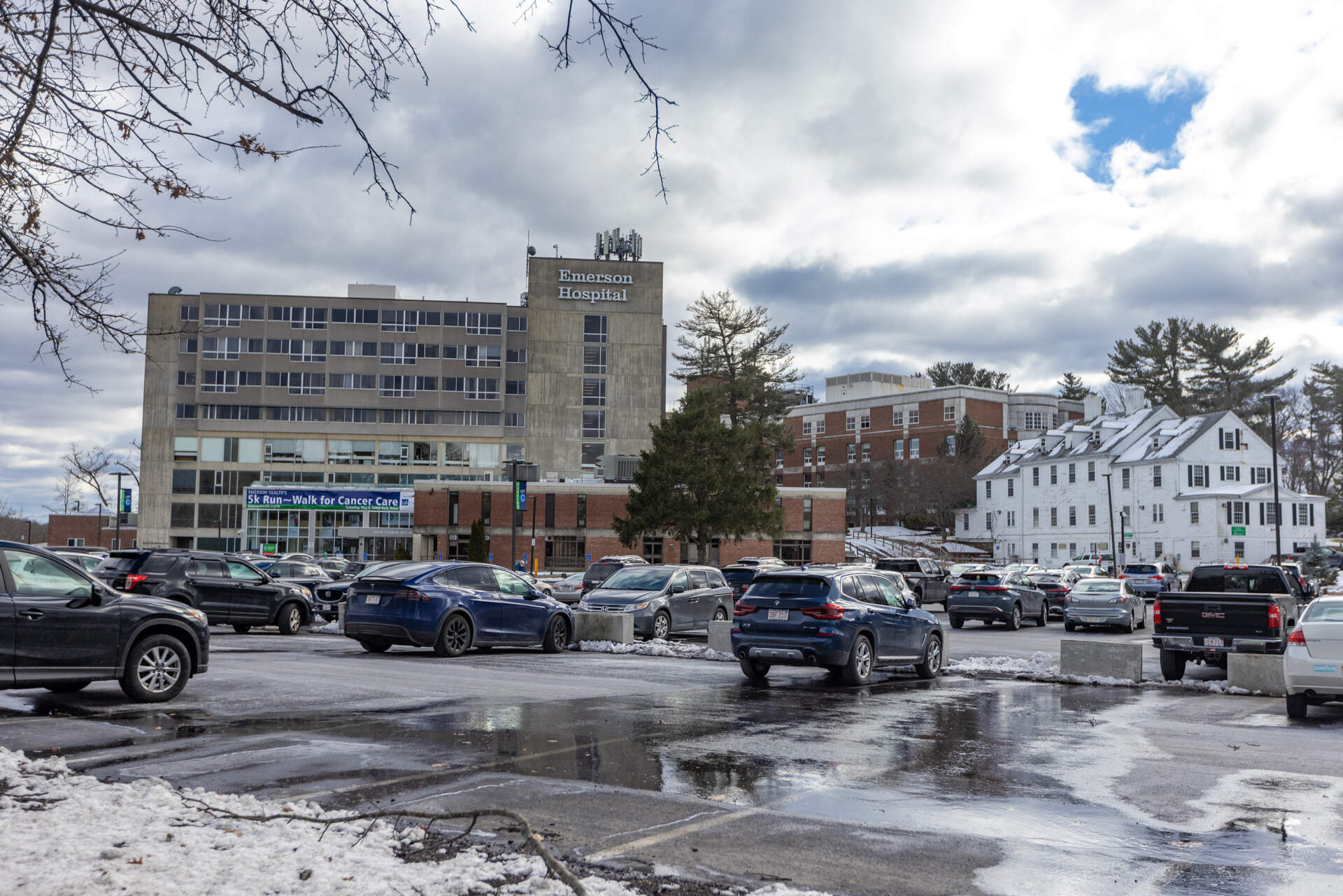 Emerson Hospital in Concord. The outpatient addiction treatment program was run out of the white colonial on the right. (Jesse Costa/WBUR)