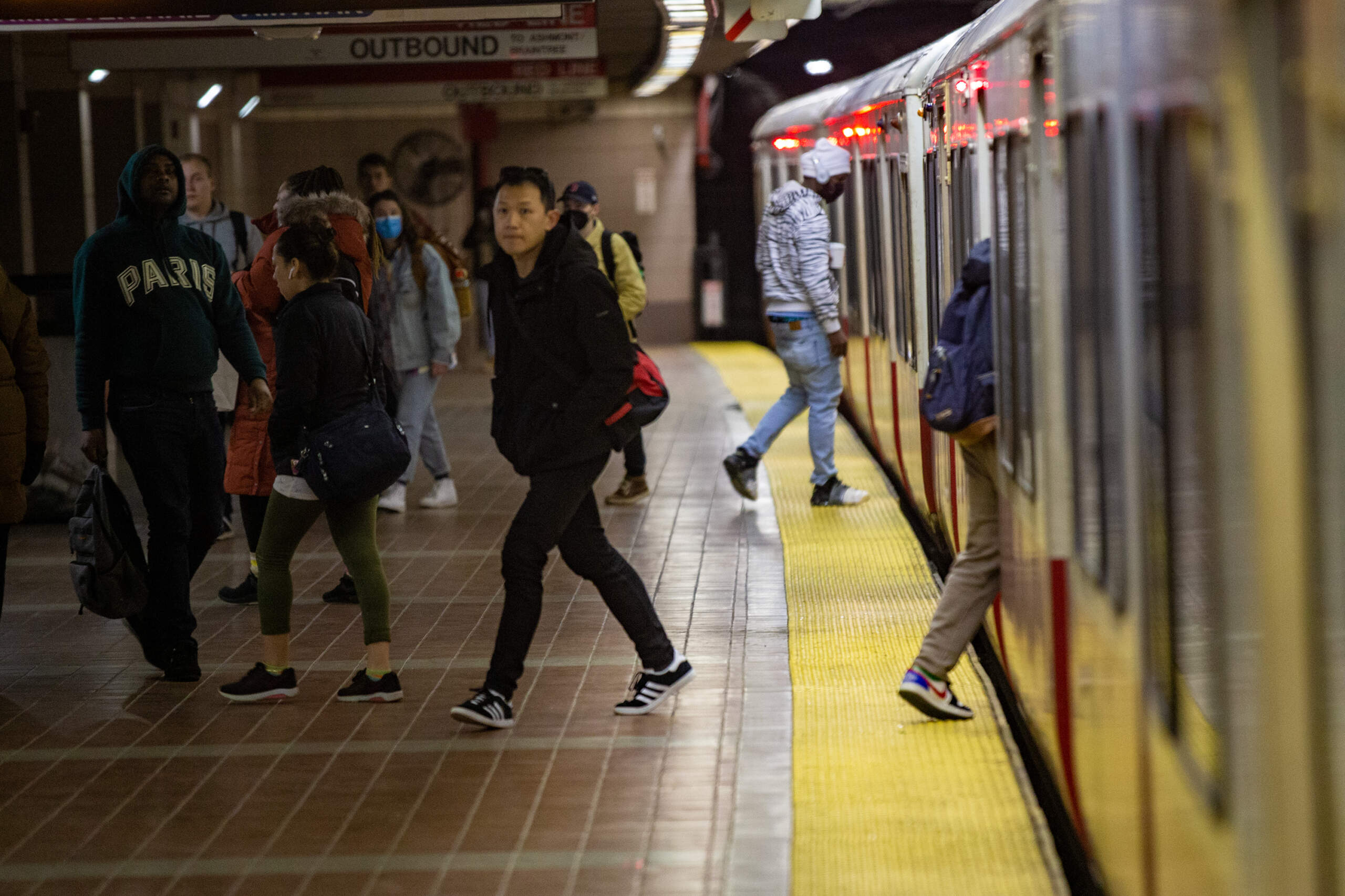 Riders board and get off a Red Line train in South Station. (Jesse Costa/WBUR)